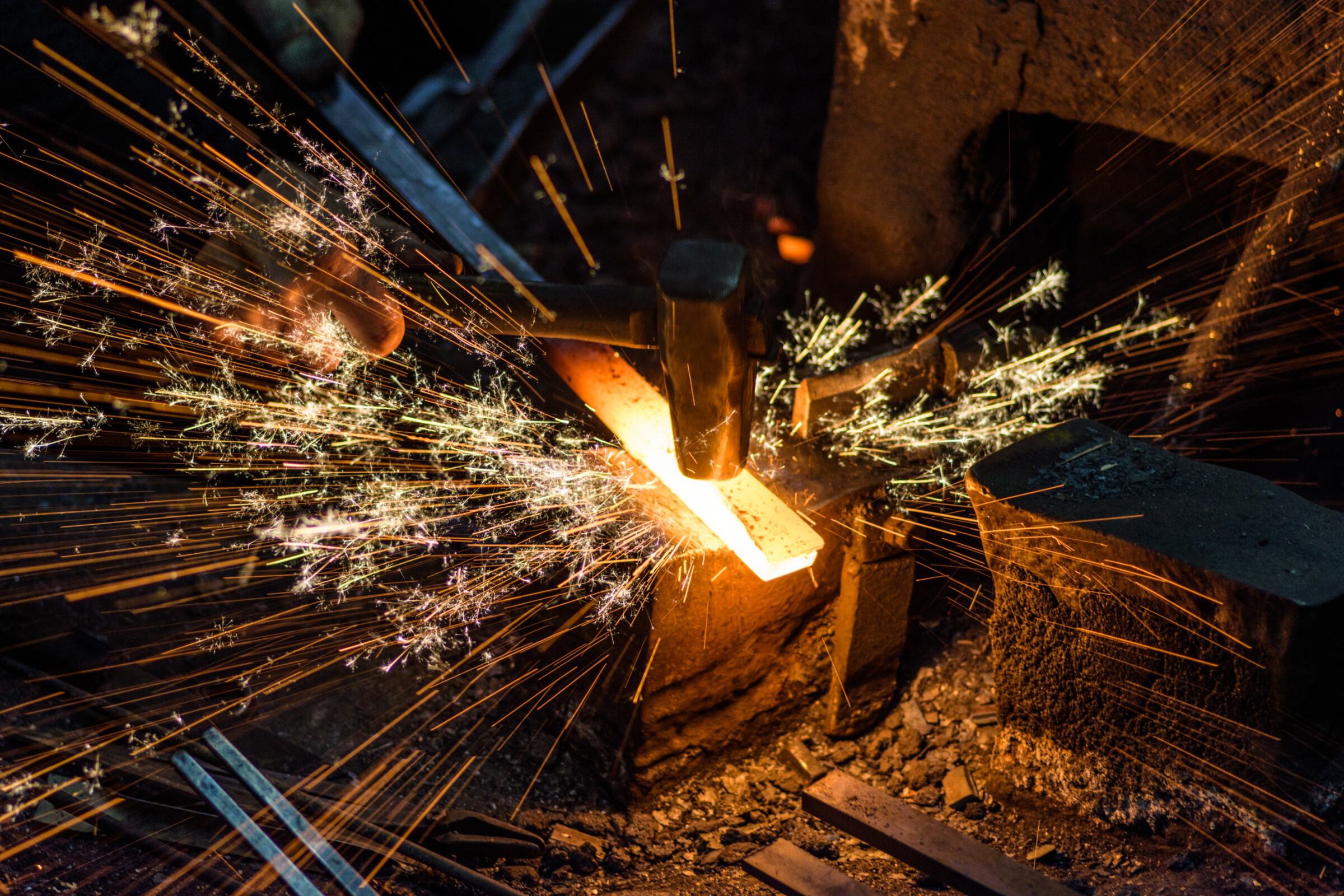 Tasker performing a Blacksmithing job.